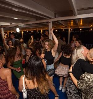 a group of people dancing at a party