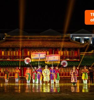 a group of people standing in front of a building