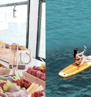 a woman in a bikini riding a surfboard on the water