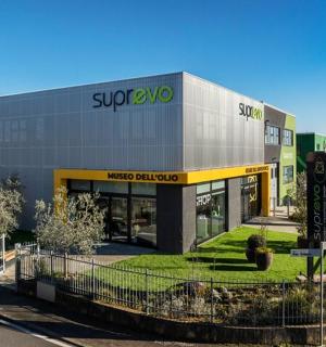 a store front of a building with a fence