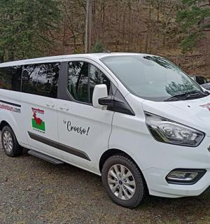 a white van parked in a parking lot