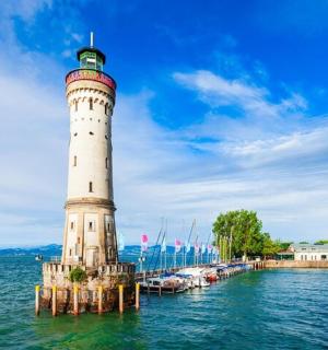 a lighthouse in the middle of the water