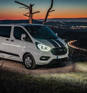 a white van parked on the side of a road