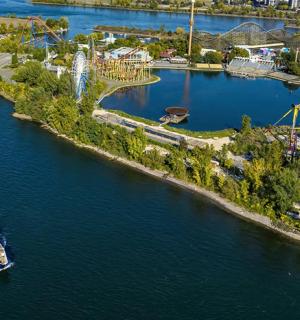 an aerial view of a boat in a river
