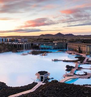 an aerial view of the blue lagoon at a resort