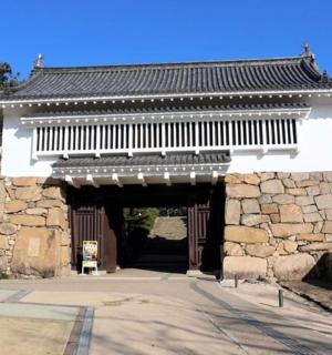 an entrance to a gate to a building