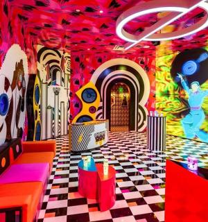 a room with a painting on the wall