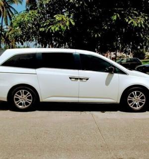 a white car parked in a parking lot