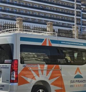 a van is parked in front of a building