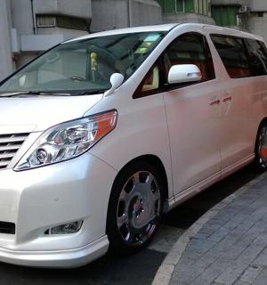 a white van parked on the side of a street