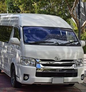 a white van parked on the side of a street