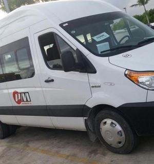 a white van parked in a parking lot