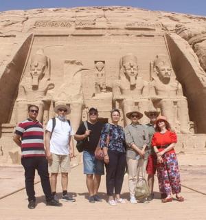 a group of people standing in front of anaraoh