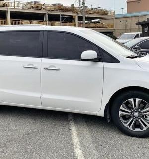 a white van parked in a parking lot
