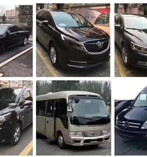 four different vehicles parked in a parking lot