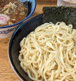 a bowl of noodles and a bowl of soup
