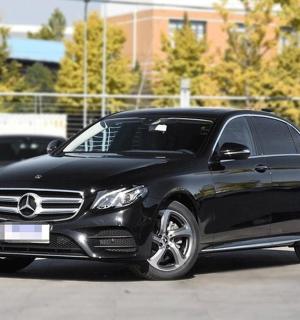 a black car parked in a parking lot