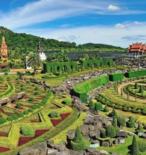 an aerial view of a garden at a temple
