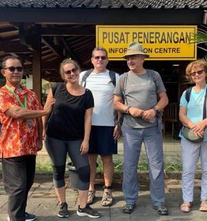 a group of people standing in front of a building