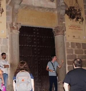 a group of people standing in front of a door