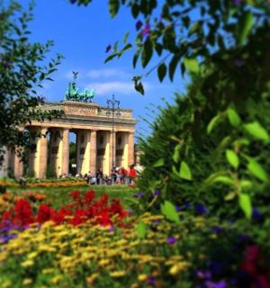 a building with a bunch of flowers in front of it