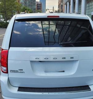 a white van parked on the side of a street