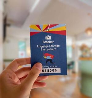 a person holding a card in their hand