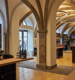 a wine store with arched ceilings in a building