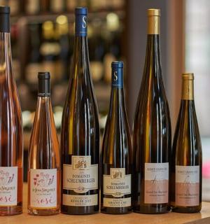 a group of wine bottles sitting on a table