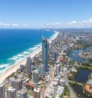 an aerial view of a city and the beach