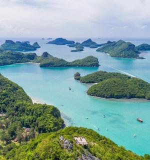 an aerial view of a group of islands in the ocean