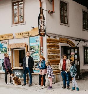 a group of people standing in front of a store