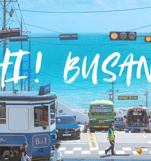 a sign that says i britain on a busy street