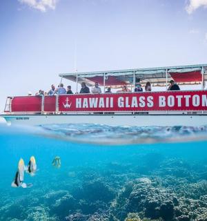 a boat in the ocean with people on it