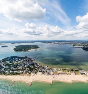 an aerial view of an island in the water