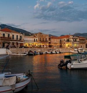 a group of boats are docked in a harbor