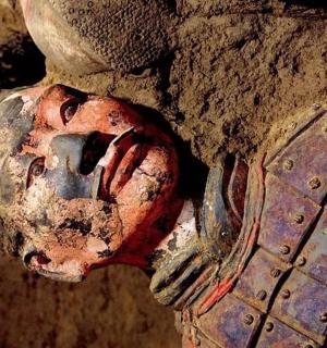 an old fire hydrant is sticking out of the ground