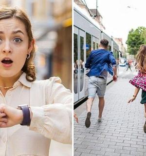 一位女士指着她的手表，人们走在街上