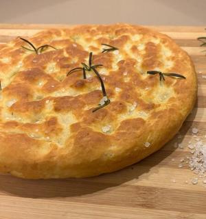 a pot pie sitting on a cutting board