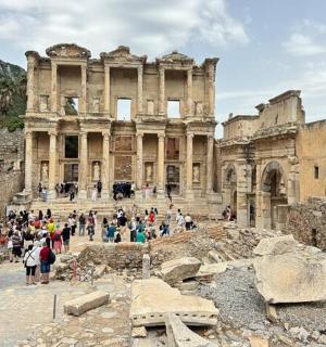 a group of people standing in front of a building