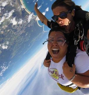 a man standing on top of a woman