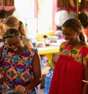 a group of women looking at their cell phones