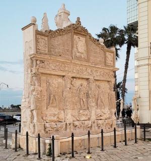a building with a statue in front of a building