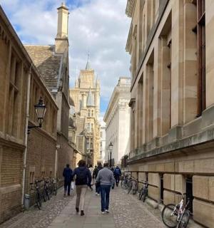 a group of people walking down a street