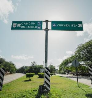 a street sign on the side of a road