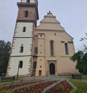 a church with a tower with a clock on it