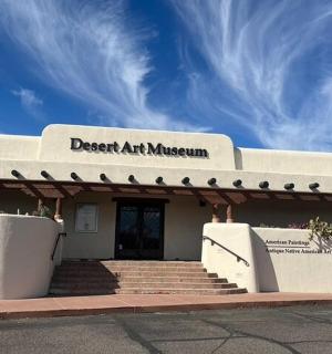 a building with a sign that reads desert air museum
