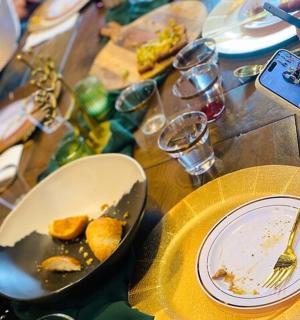 a table with a plate of food on top of it