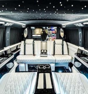 a room with two seats in a limousine
