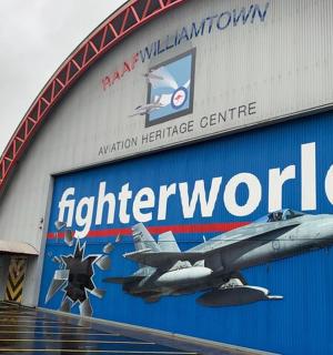 a building with an airplane on the side of it